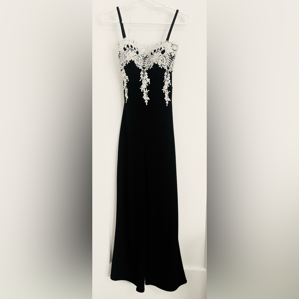 Formal straight leg, black pant suit with ivory brocade embroidery. Never worn.